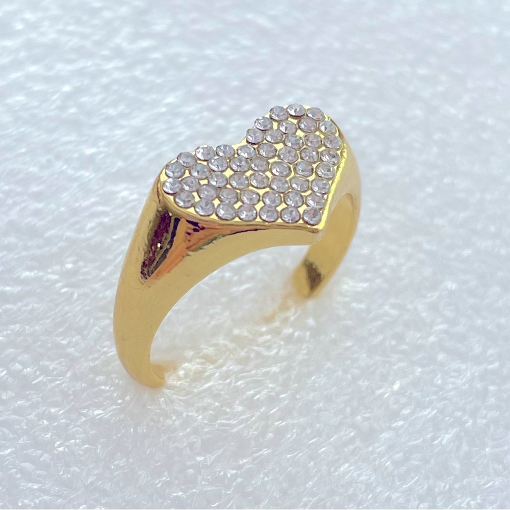 Crystal Heart Rings On Gold Sitting